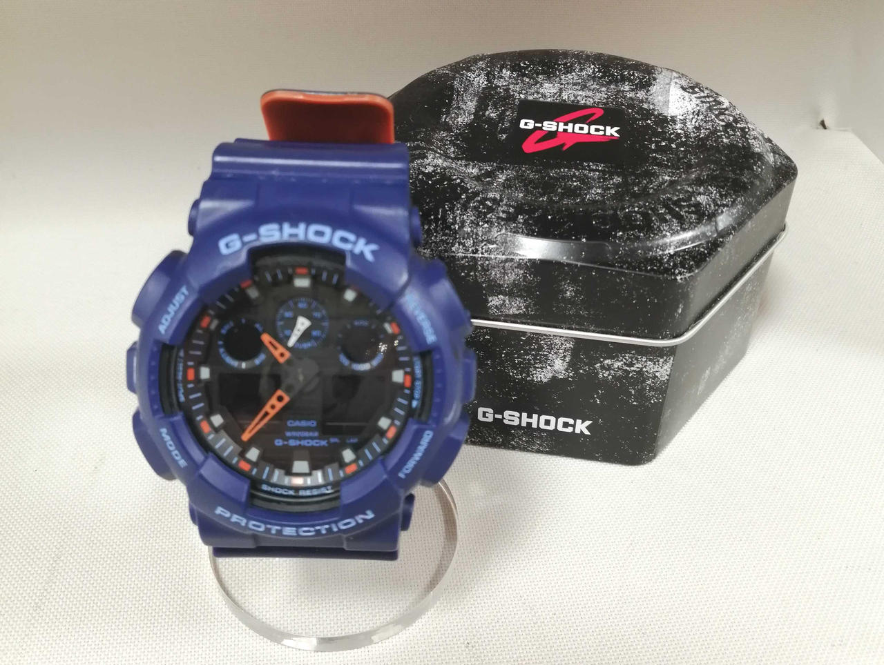 CASIO G-SHOCK GA100L-2A NVY×ORE with scratches