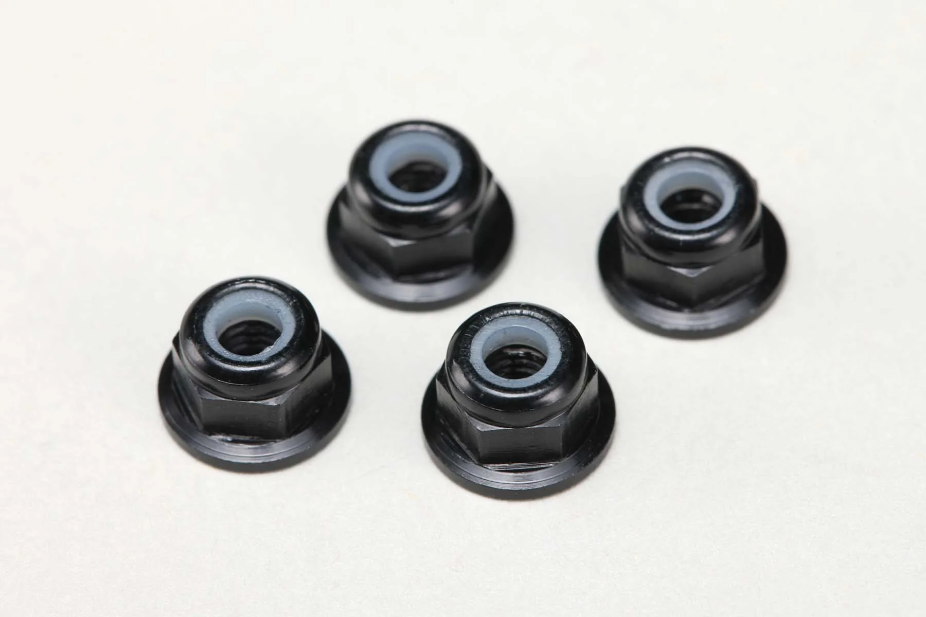 Yokomo ZC-N3AFBK Flanged Lock Nut (Pack of 4, Black)